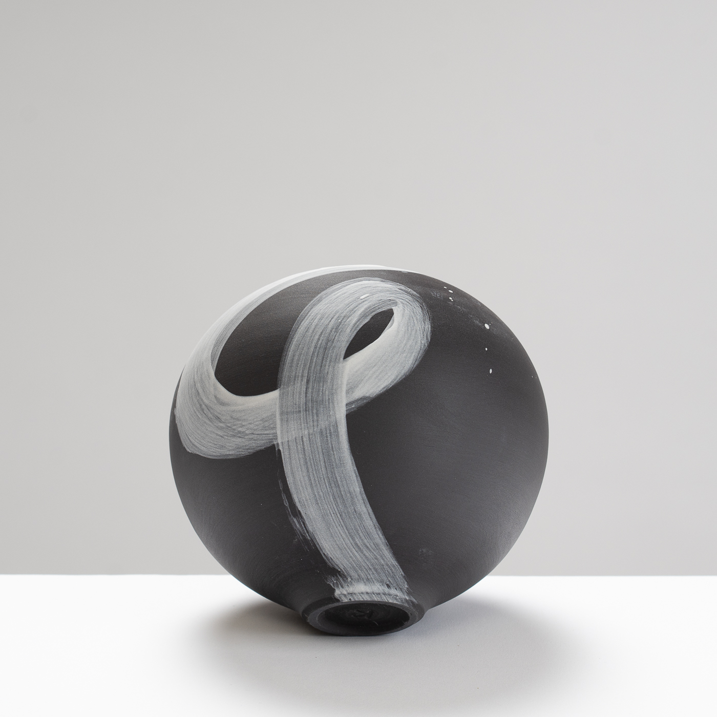 TT525Y181 Mini Moon Jar Black Porcelain White Splash